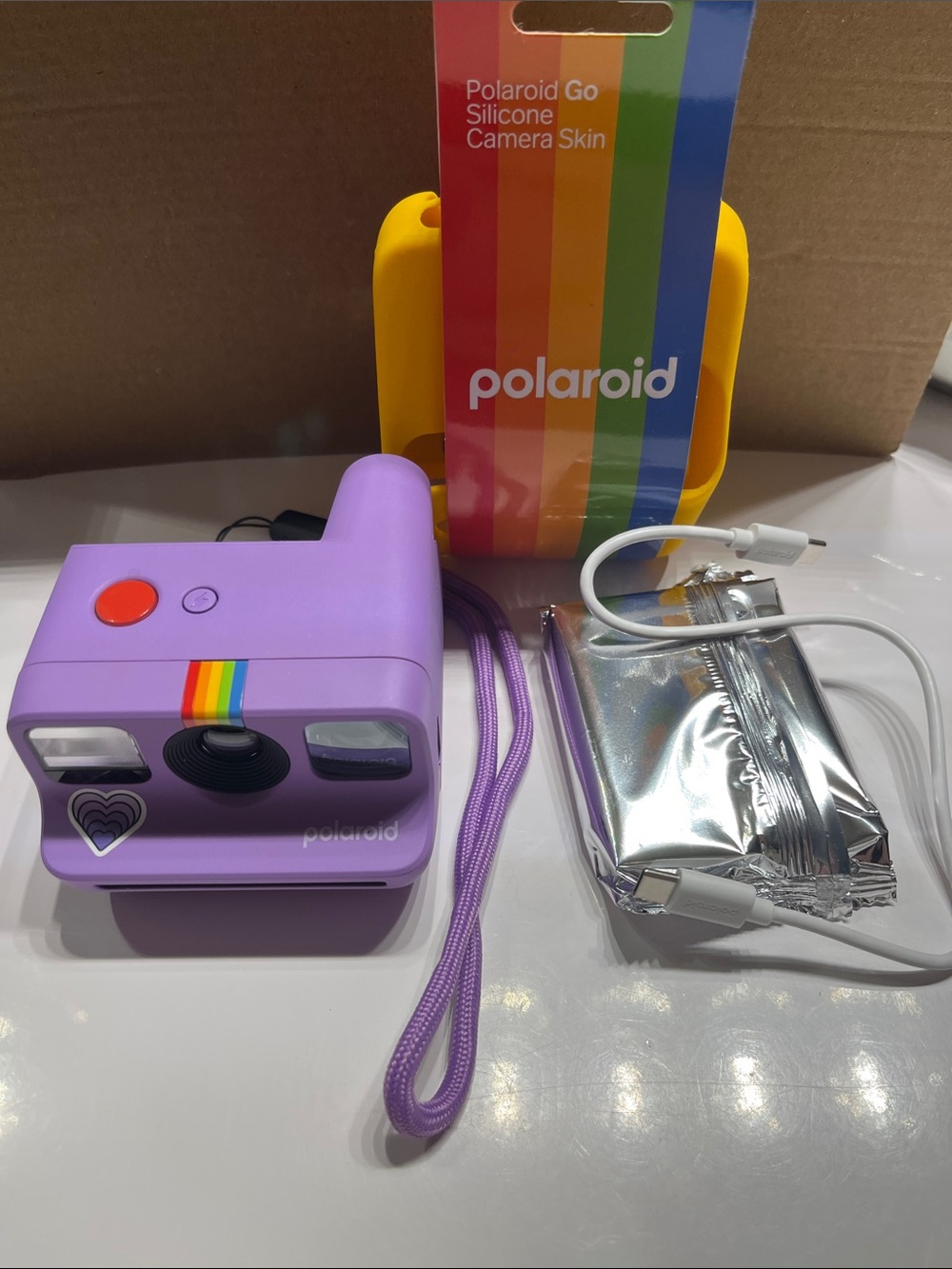 New Polaroid Lavender Purple Instant Camera with Rainbow Accent and Yellow Case